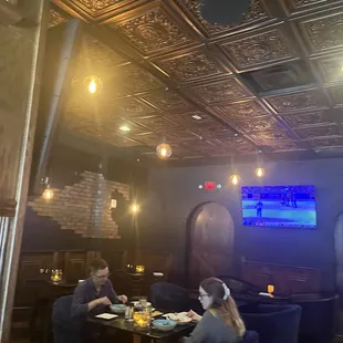 two people sitting at a table