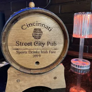 a wooden barrel on a table