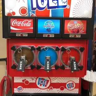 a vending machine with soda and ice