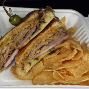 Cubano sandwich topped with very spicy pepperoncini.