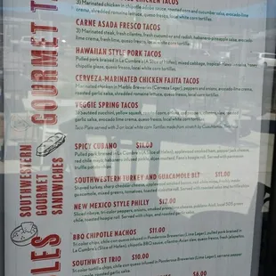 Menu board next to the door.