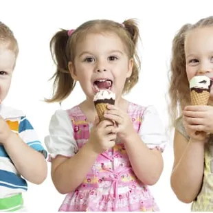 three children eating ice cream cones