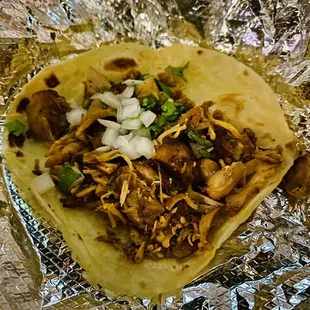  a taco covered in foil