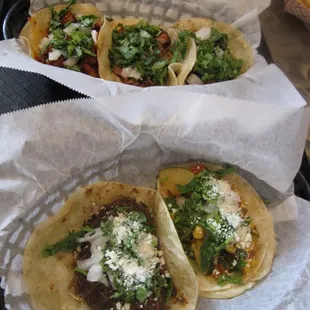 At the top: chicken, carnitas, al pastor. Bottom: shredded beef and veggie.