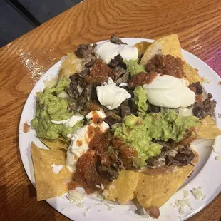 DELICIOUS steak nachos.