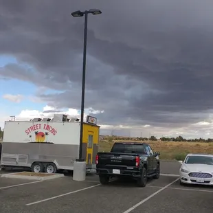 a taco truck parked in a parking lot