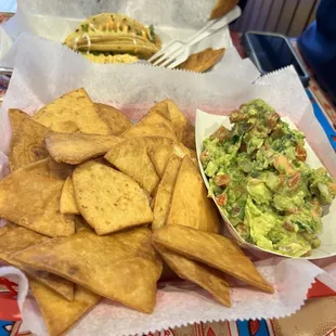Flour tortilla chips and fresh guacamole