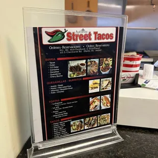 a menu displayed on a counter