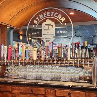 a bar with beer taps