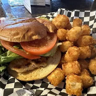 Grilled chicken sandwich and tater tots