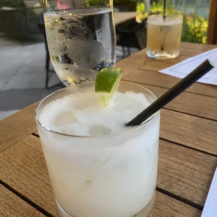 Citrus drink, wings and avocado toast