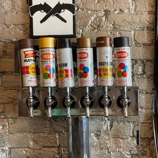 a row of beer taps
