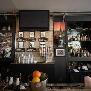 a bar with bottles of alcohol