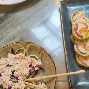 Naruto sushi, crab salad, chiken, beef and pepper noodles dish