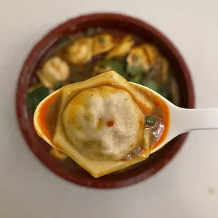 These ravioli style dumplings are actually ingenious.  Less labor intensive to make and are the perfect size to eat in 1 bite