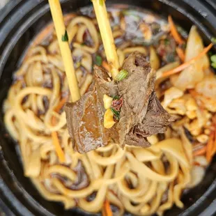 Tender beef within the la mien Noodle Soup. Flavorful broth.
