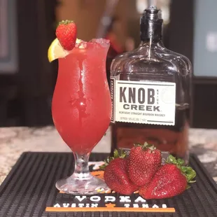 a drink and strawberries