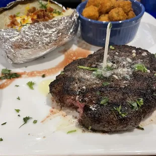 Chopped steak, loaded baked potato and fried okra