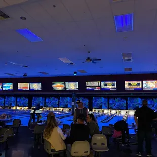 a bowling alley full of people