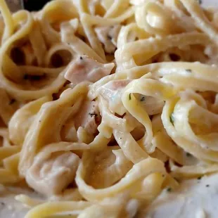 Plain pasta. Very blanned like. Alfredo tasted store bought. Chicken was flavorless