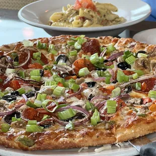 a large pizza on a plate