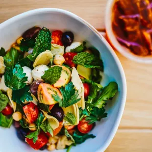 The Med Chop: Fresh Mozzarella, Green Beans, Garbanzo, Tomato, Olives, Artichoke, Arugula &amp; Herbs