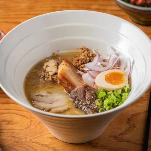 a bowl of ramen and a bowl of soup