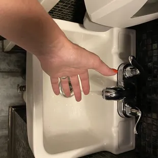 Tiny sink in the very clean bathroom