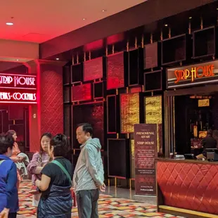 a group of people standing in line