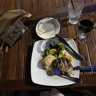 Steak was cooked as ordered, potatoes were nice and garlicky (which we like). Wife was impressed with the wine