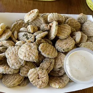 Fried pickles and jalapeños with a side of Farmstead sauce