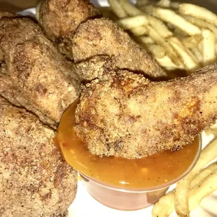 Strip&apos;s Jumbo &quot;Nearly Naked Wings&quot; are like a dry-rub. Taste great without sauce but made for dipping without messy hands!