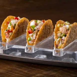 Chilled Lobster Tacos with grilled pineapple, avocado cream, micro cilantro