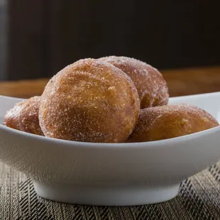 Malasadas with a choice of filling Kona Coffee, Tahitian Vanilla, Ube