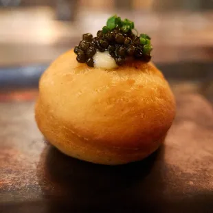 Caviar jelly donut (daurenki caviar, yuzu curd, chive)