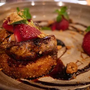 Pan seared Hudson Valley Foie (macadamia nut, strawberry, mirin-sake gastrique, rice cake)