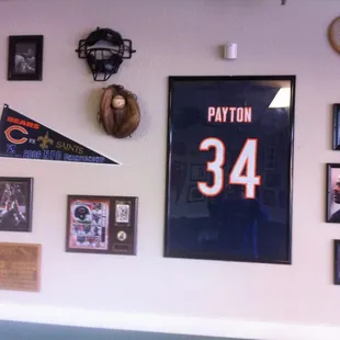 A wall showing their love of sports.