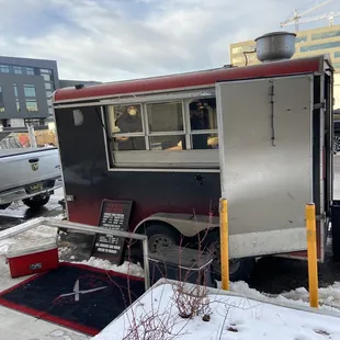 a food truck parked in a parking lot