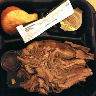 BBQ Baked Potato Thursday Special. Look closely for a nice-size baked potato under that heaping mound of pulled pork.