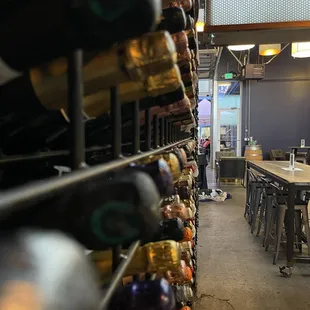 a wine rack with bottles of wine