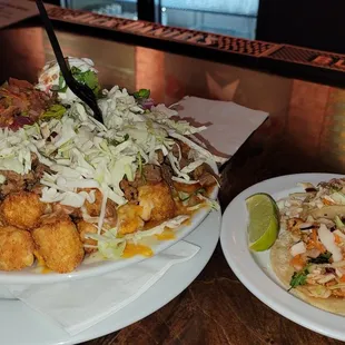 Super tots with asada and chicken thai tacos