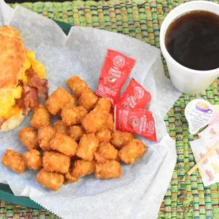 Bacon, Egg &amp; Cheese Biscuit with Tator Tots and Coffee