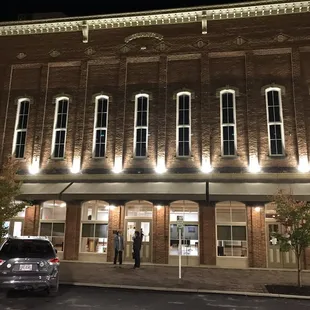 a car parked in front of it