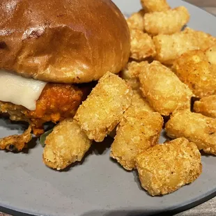 Buffalo chicken sandwich with tots