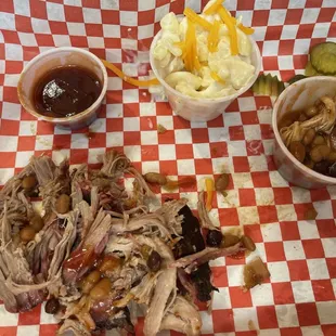Pulled pork plate with Mac n cheese and baked beans. Toast went missing quick ;) (so yummy) get extra