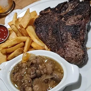 Porterhouse, fries, mushrooms.