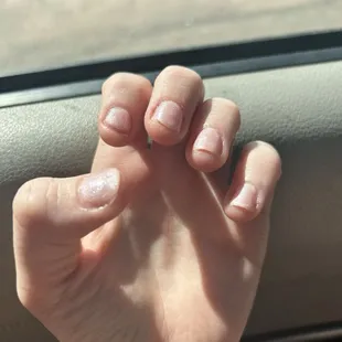 Unprofessional nail services and messy results.
