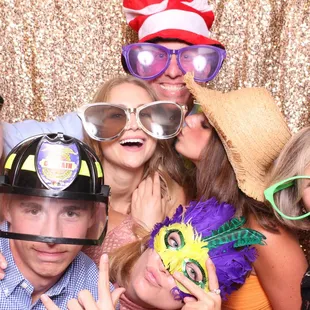 Our photo booths comfortably fit more than 10 people in each shot. We give you all access to an online gallery of your images...