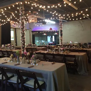a long table set for a wedding reception