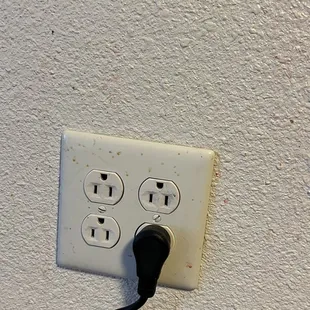 Dirty outlet and wall